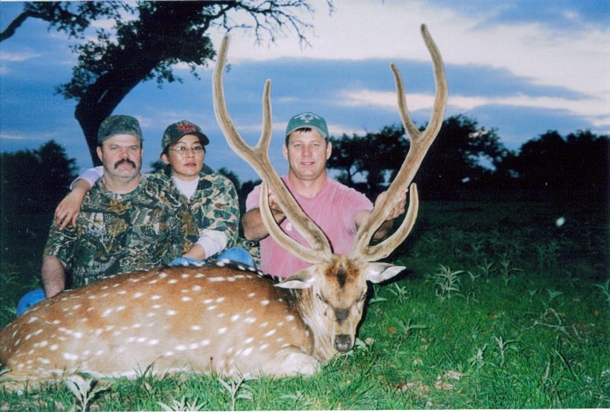 Cordie Hudkins with a beautiful Axis deer.